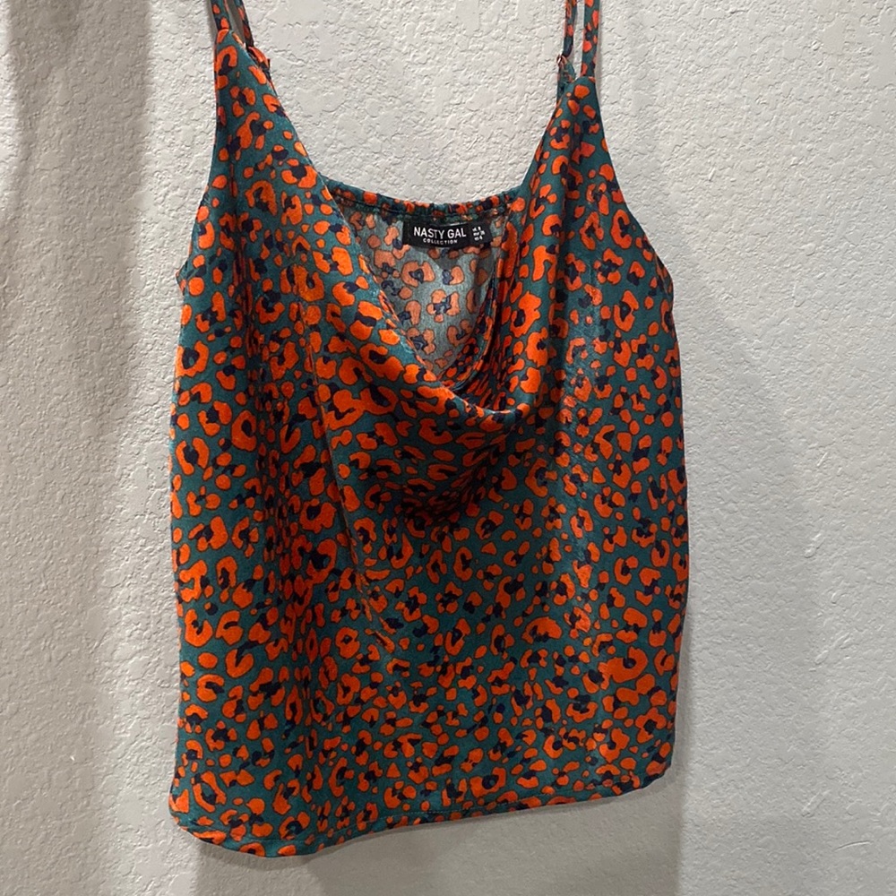 Green and red cheetah print shirt